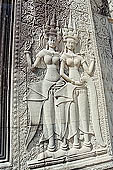 Angkor Wat temple, the fourth enclosure, the bas reliefs of the west gopura, superbly preserved devatas, either individually or in groups of two or three, amongst the finest in the monument. 